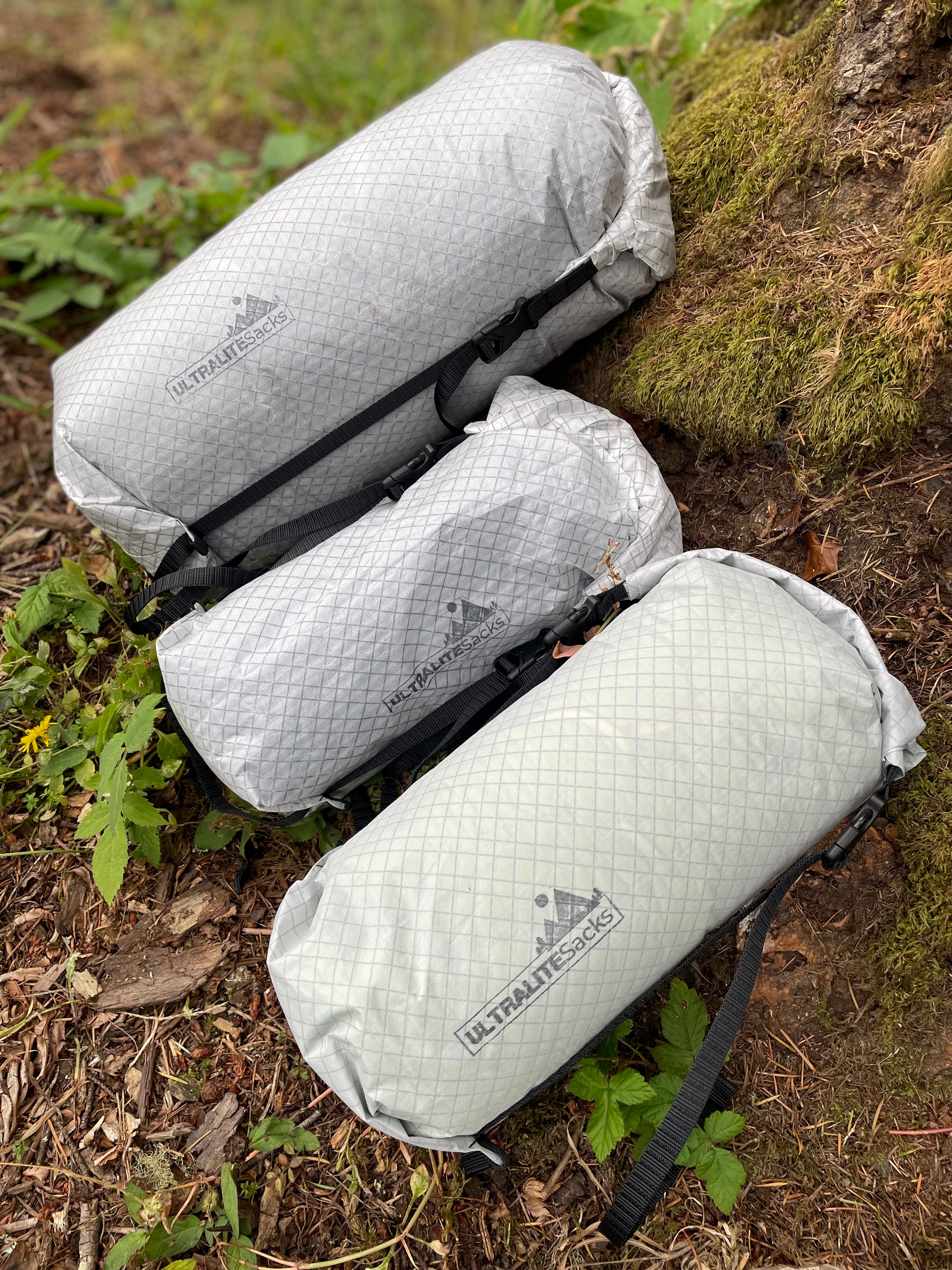 Compression sacks top for backpacking